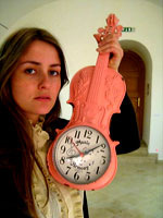 Click For Enlargement: Marie Mart, here featured with one of the museum's clock violins
