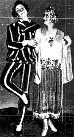 rupert hazell as abanazar makes love to the pretty pricess june elvidge in the pantomine aladin